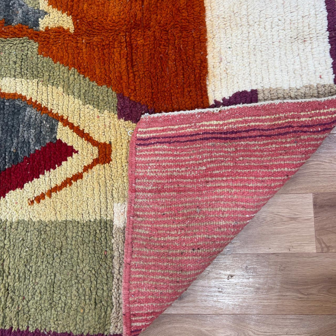 Vintage Moroccan wool rug 7.91 × 5.38 ft Rug 83 with abstract architectural design in beige, terracotta, pink and olive tones