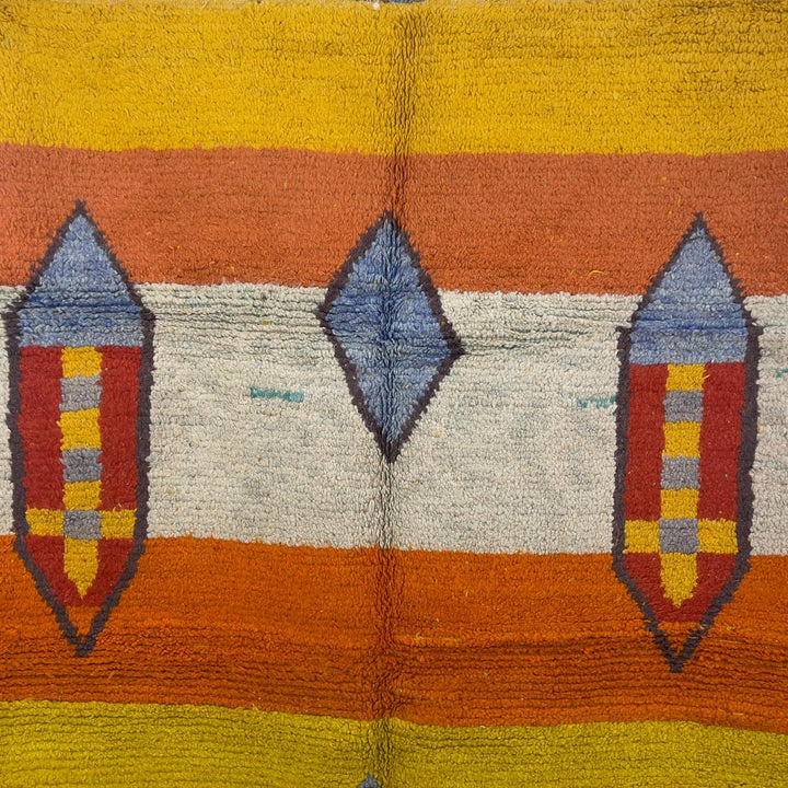 Vintage Moroccan wool rug 8.40 x 5.51 ft Rug BM1256 with colorful striped design and geometric diamond motifs in yellow, orange, pink, turquoise and earthy tones
