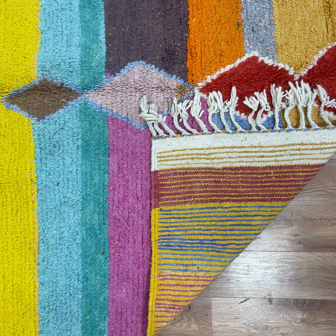 Vintage Moroccan wool rug 8.40 x 5.51 ft Rug BM1256 with colorful striped design and geometric diamond motifs in yellow, orange, pink, turquoise and earthy tones