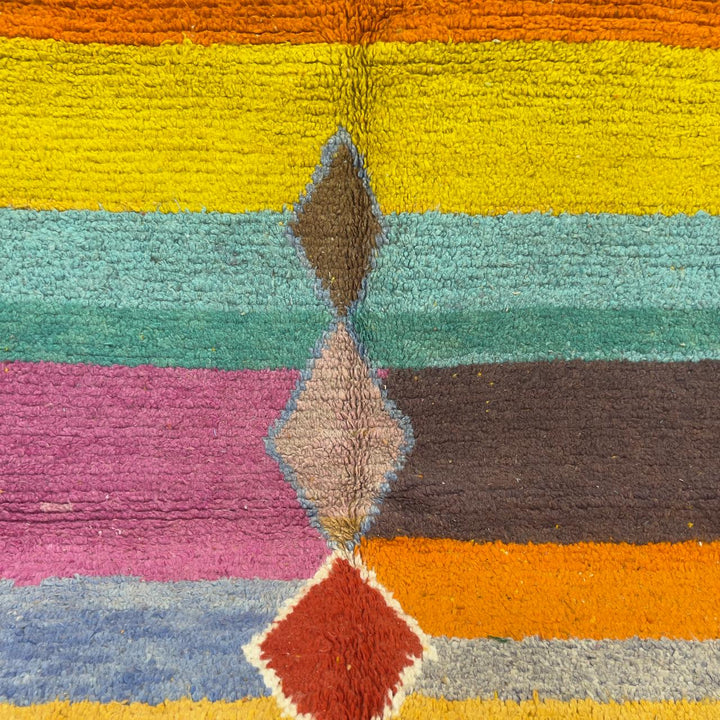 Vintage Moroccan wool rug 8.40 x 5.51 ft Rug BM1256 with colorful striped design and geometric diamond motifs in yellow, orange, pink, turquoise and earthy tones