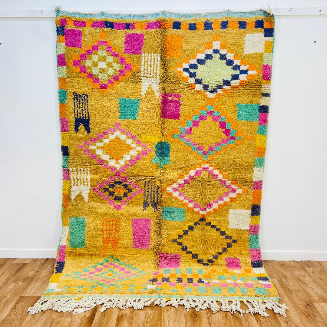 Vintage Moroccan wool rug with mustard yellow base and colorful Berber diamond patterns, handmade in Morocco, size 240x170 cm