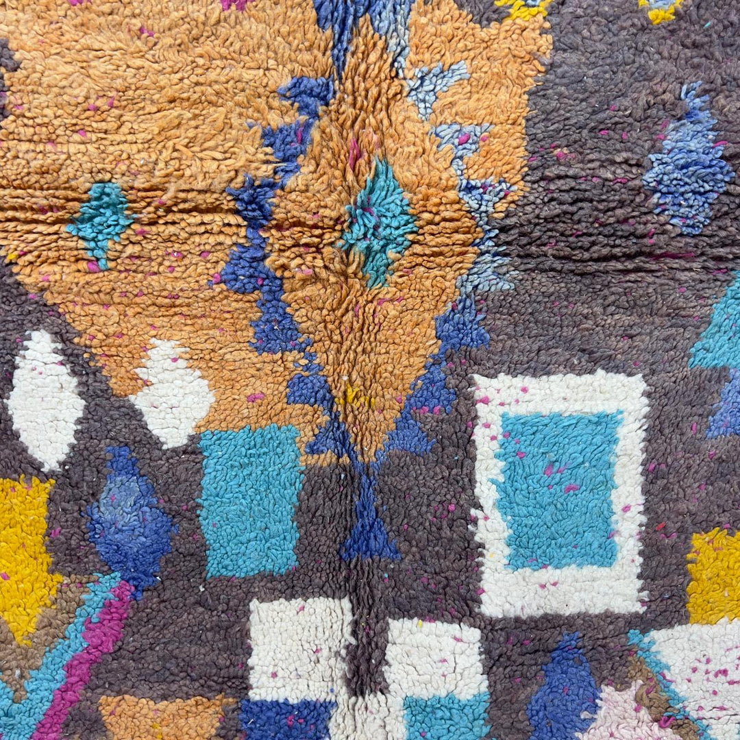 Vintage Moroccan wool rug 8.53x5.68 ft, handmade Berber shag carpet with colorful geometric tribal patterns in brown, pink, blue and mustard tones