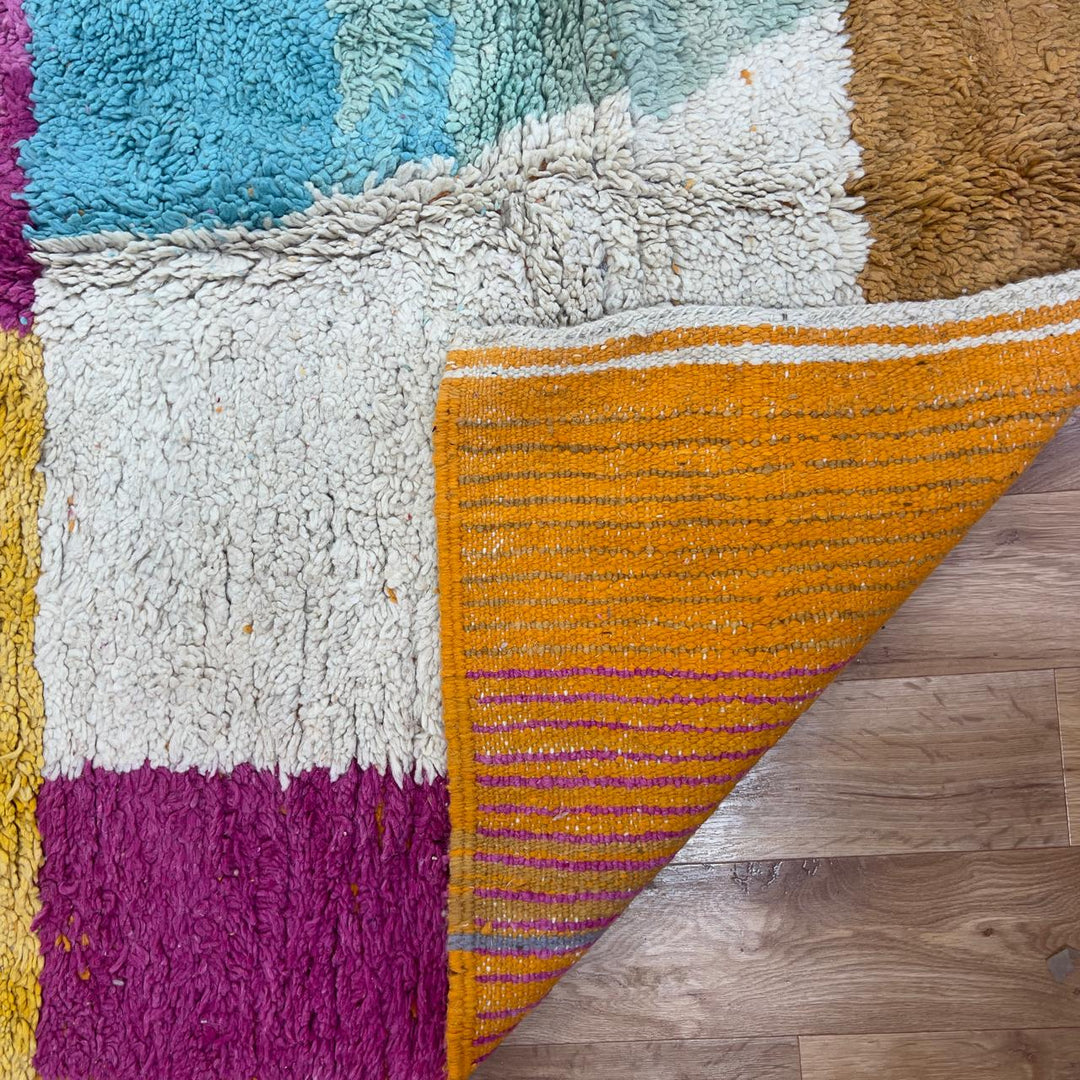 Vintage Moroccan wool rug with colorful patchwork blocks in orange, pink, yellow and blue tones, handmade Berber rug 8.33 x 5.09 ft
