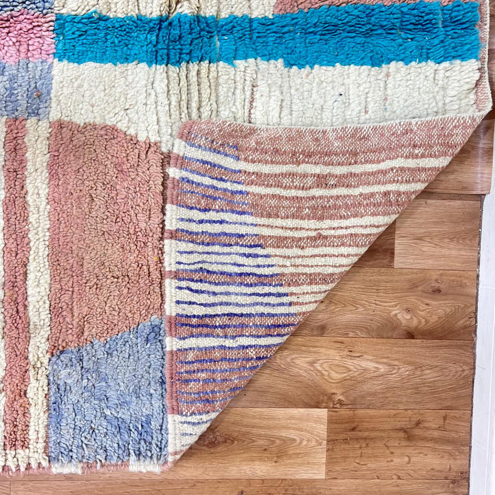 Vintage Moroccan wool rug with blush pink and neutral striped pattern