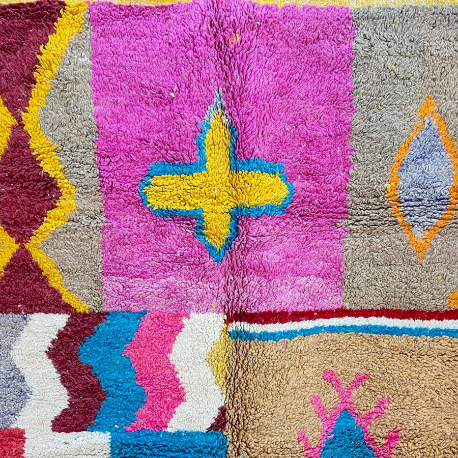 Vintage Moroccan wool rug with colorful patchwork blocks and tribal symbols in yellow, orange, pink and turquoise, handwoven Berber carpet 254x159 cm