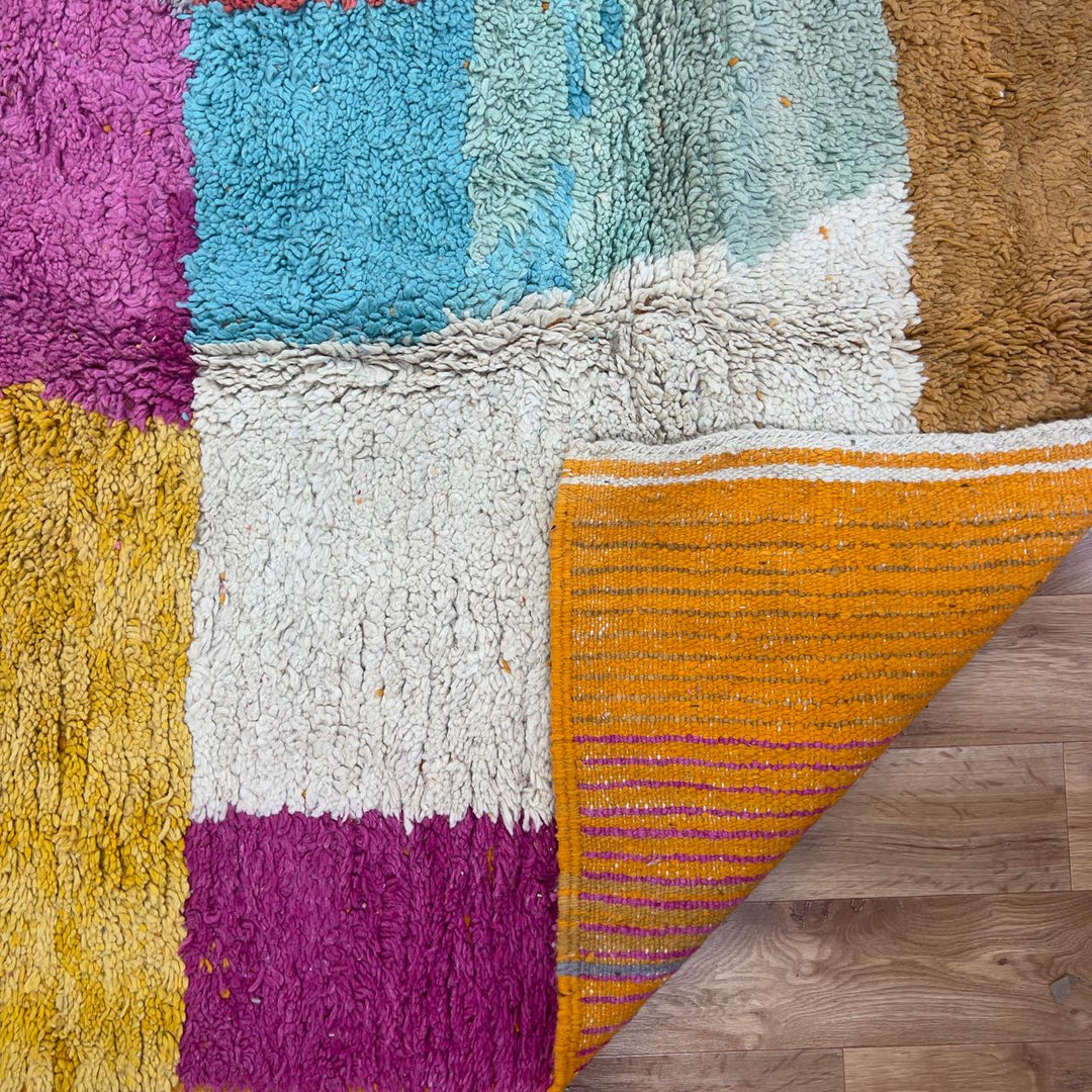 Vintage Moroccan wool rug with colorful patchwork blocks in orange, pink, yellow and blue tones, handmade Berber rug 8.33 x 5.09 ft