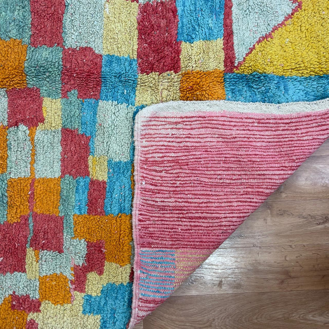 Vintage Moroccan wool rug 8.82 x 5.35 ft Rug 82 with colorful patchwork geometric design in turquoise, orange, pink, yellow and cream tones
