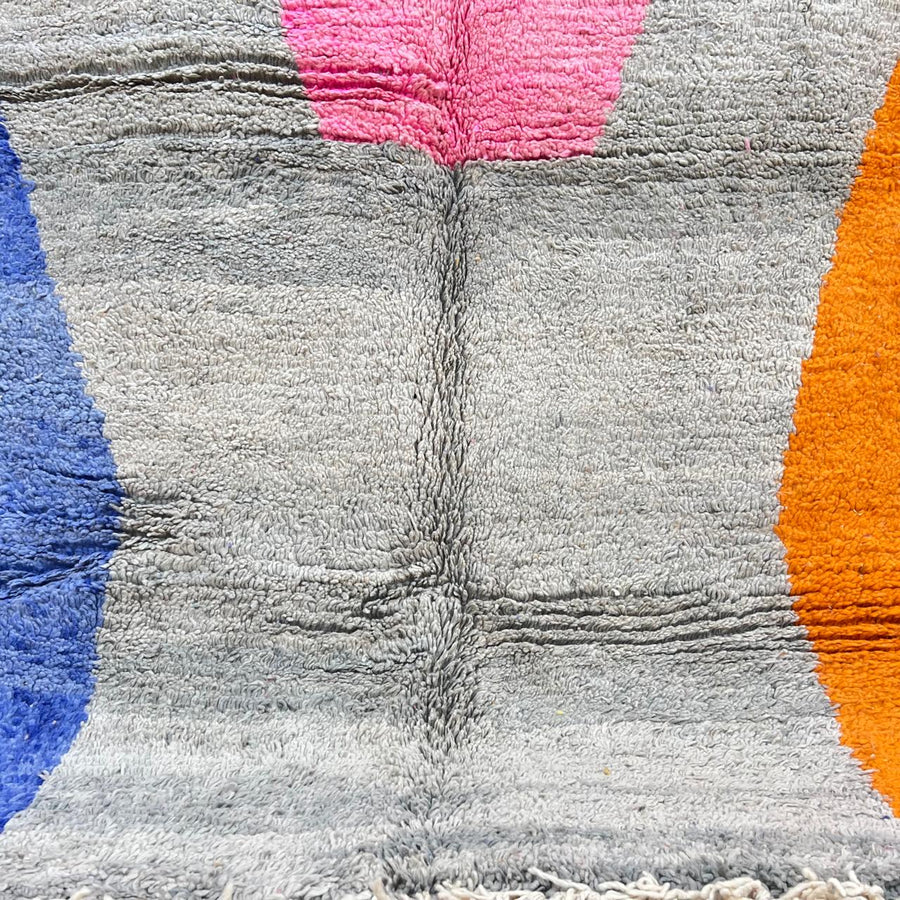 Vintage Moroccan wool rug with gray base and color-block accents in pink, blue and orange
