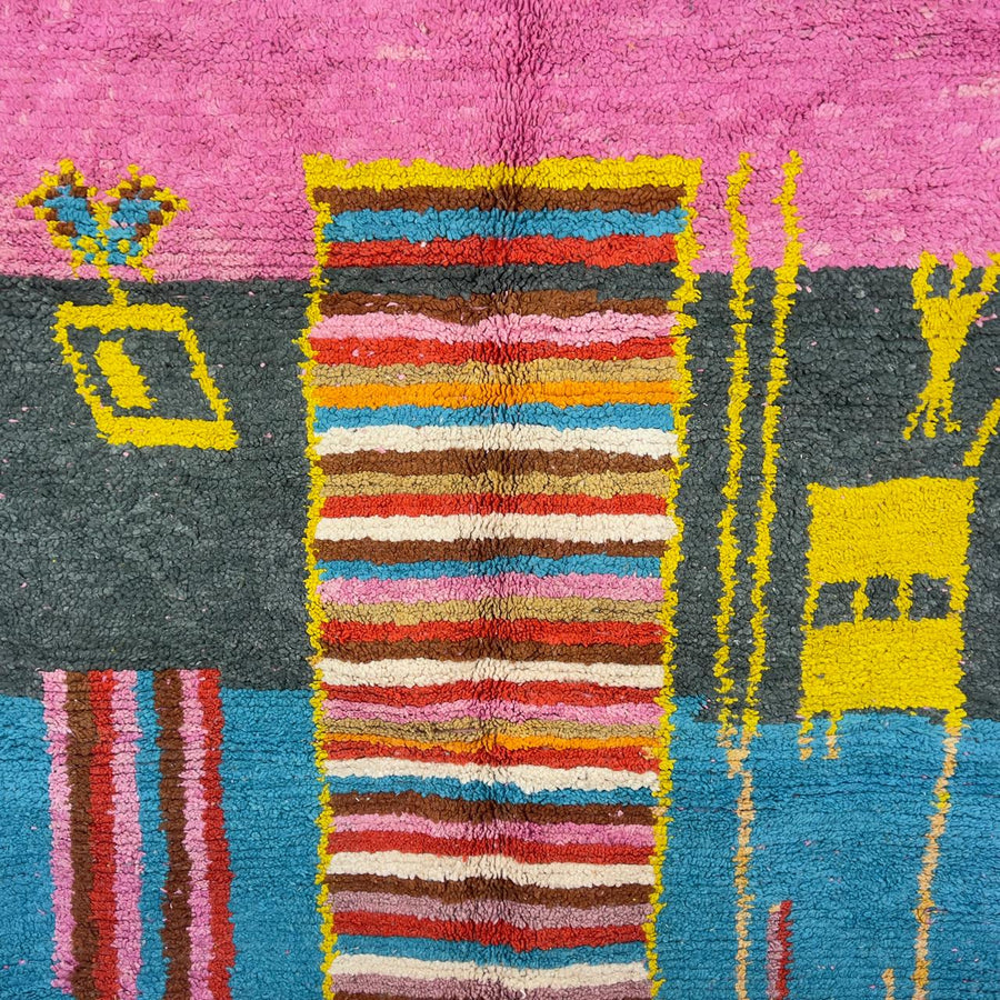 Vintage Moroccan wool rug with pink background and colorful striped central motif, handmade Berber rug 7.97 x 5.87 ft