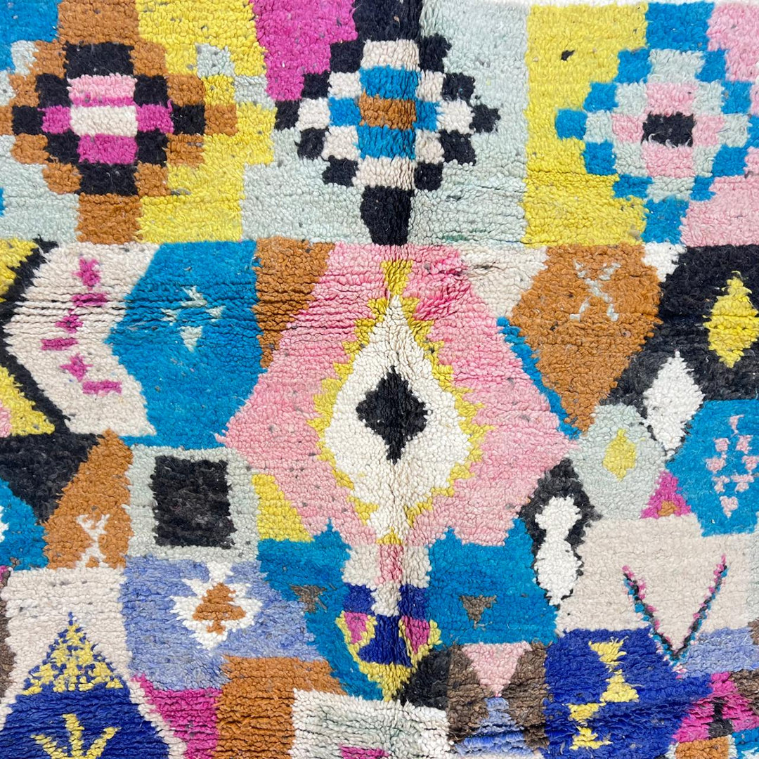 Vintage Moroccan wool rug with colorful patchwork geometric patterns in blue, pink, yellow and ivory, handwoven Berber rug 248x156 cm