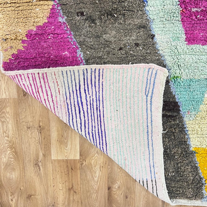 Vintage Moroccan wool rug with abstract Berber design in earthy and pastel tones, handmade in Morocco, size 238x162 cm