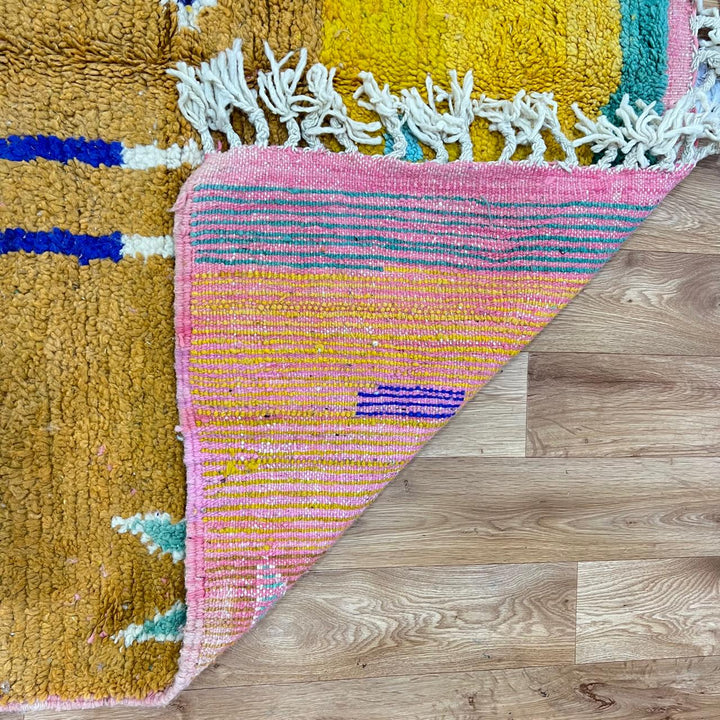 Vintage Moroccan wool rug with colorful geometric Berber diamond pattern, handmade in Morocco, size 257x150 cm.