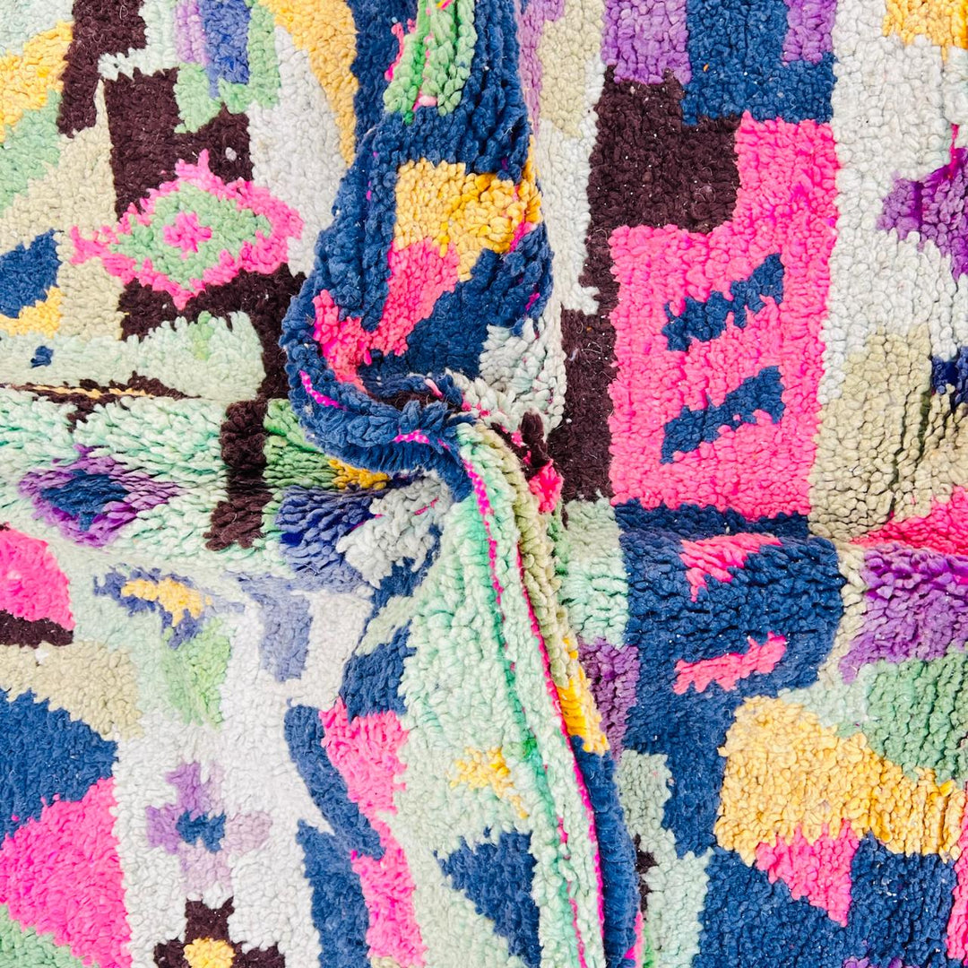 Vintage Moroccan wool rug with colorful geometric Berber pattern, pink blue cream yellow, 235x158 cm handmade in Morocco