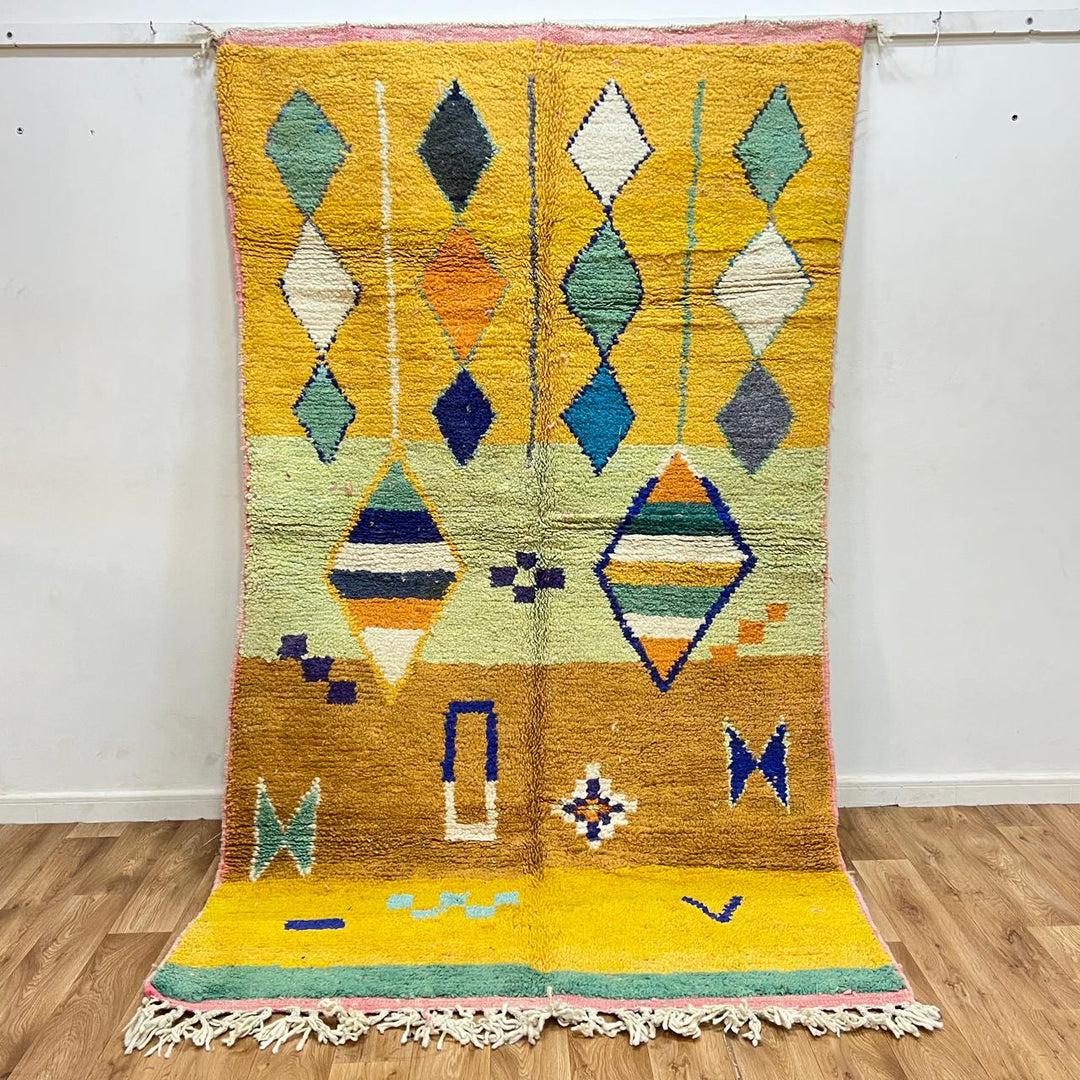 Vintage Moroccan wool rug with colorful geometric Berber diamond pattern, handmade in Morocco, size 257x150 cm.