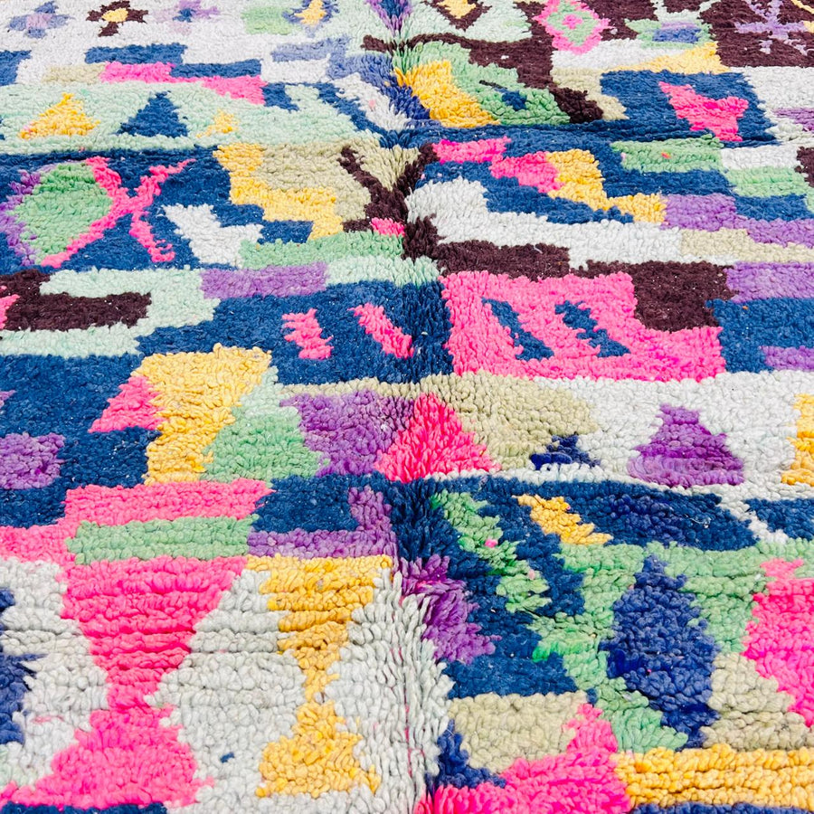Vintage Moroccan wool rug with colorful geometric Berber pattern, pink blue cream yellow, 235x158 cm handmade in Morocco