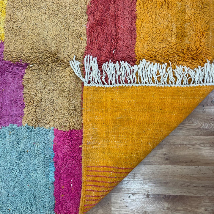 Vintage Moroccan wool rug with colorful patchwork blocks in orange, pink, yellow and blue tones, handmade Berber rug 8.33 x 5.09 ft