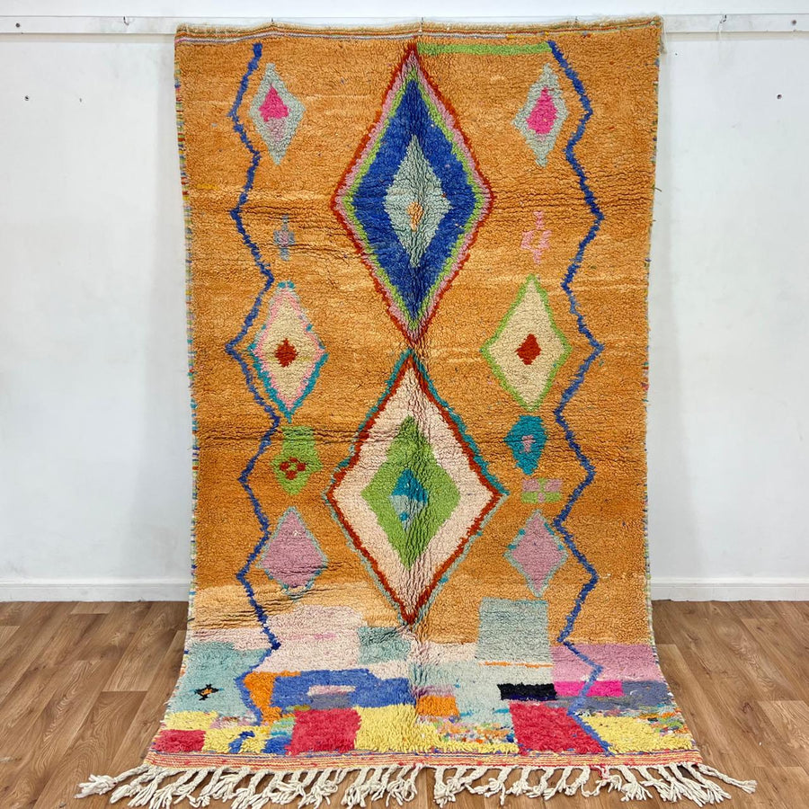 Vintage Moroccan wool rug with colorful Berber diamond patterns, handmade geometric area rug