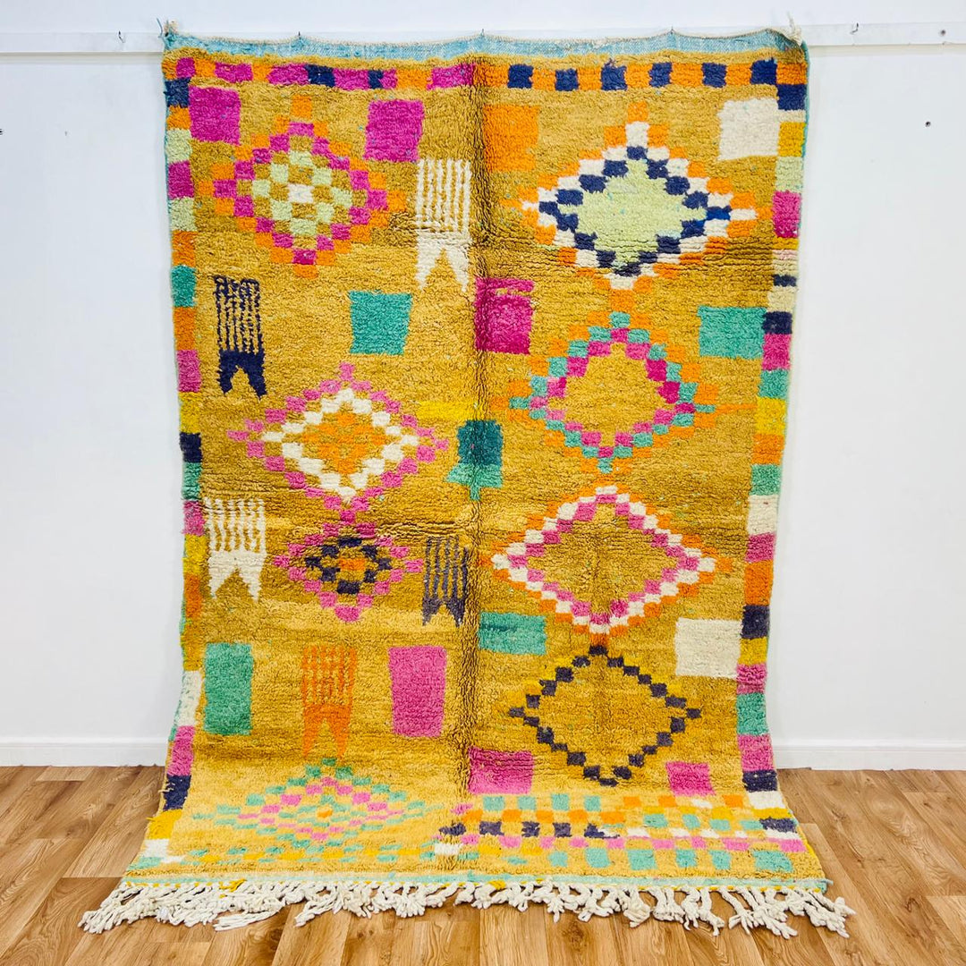 Vintage Moroccan wool rug with mustard yellow base and colorful Berber diamond patterns, handmade in Morocco, size 240x170 cm