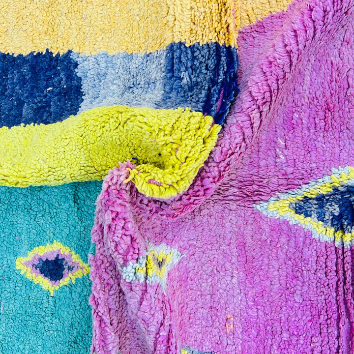 Vintage Moroccan wool rug with colorful geometric Berber pattern, handmade in Morocco