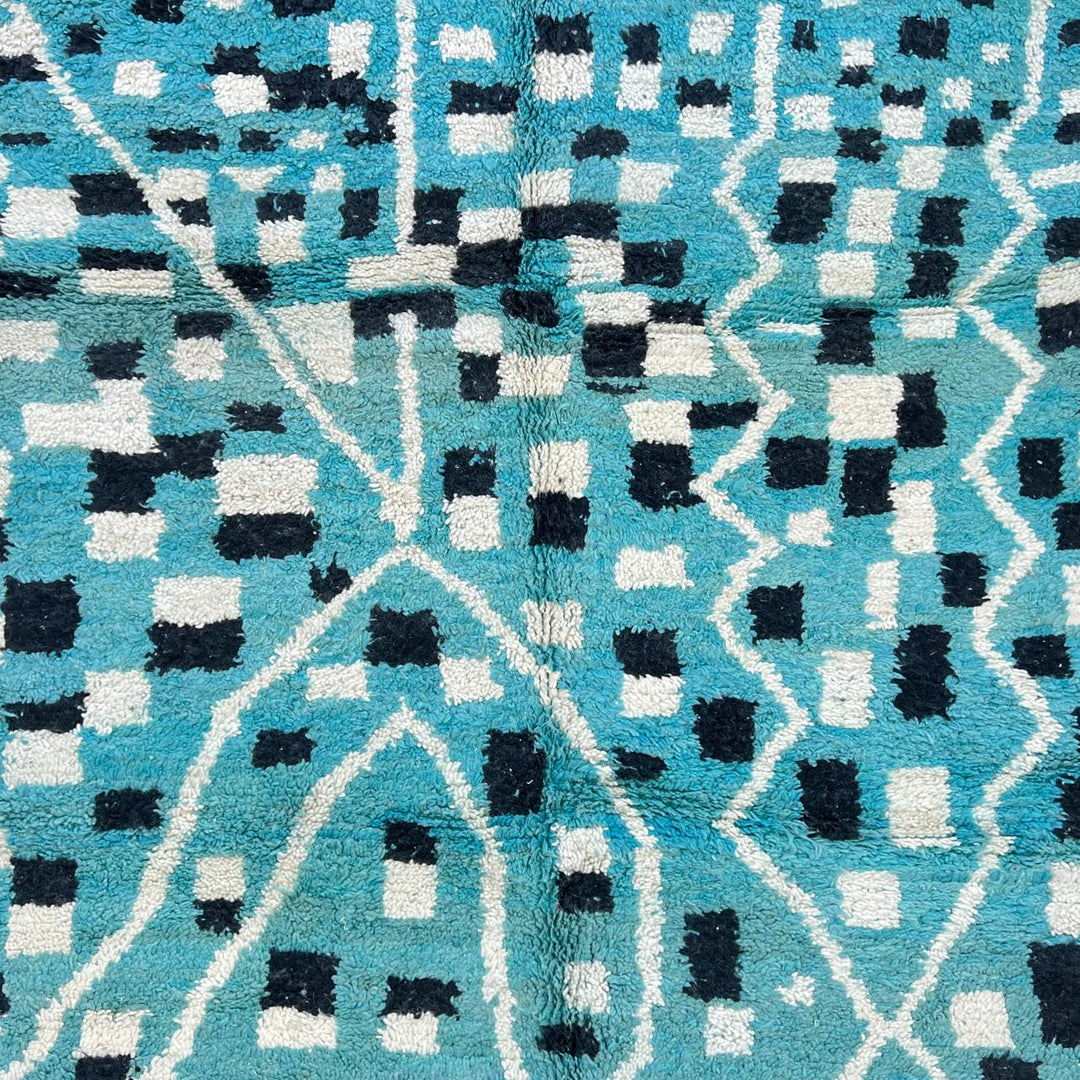 Vintage Moroccan wool rug in turquoise blue with black and ivory Berber geometric patterns