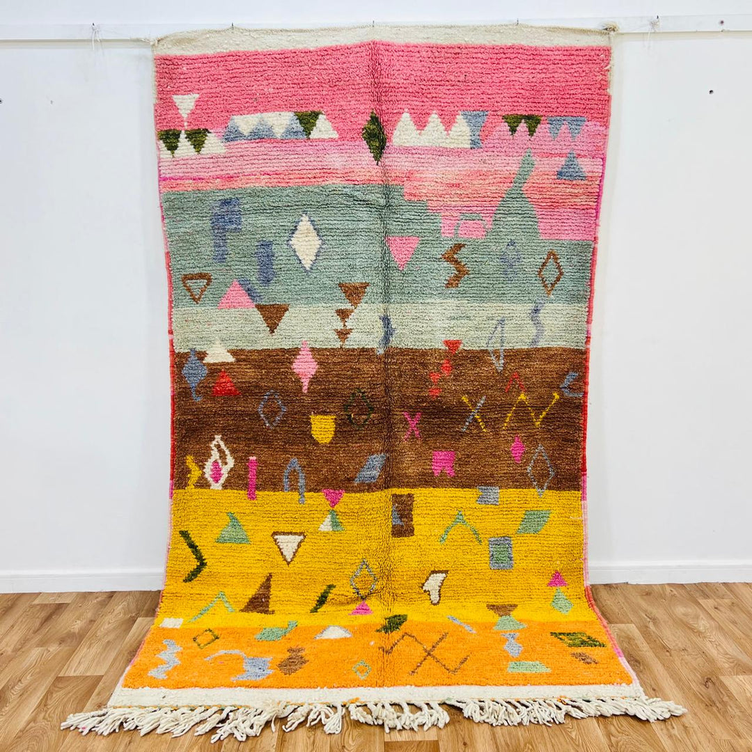 Vintage Moroccan wool rug with colorful abstract Berber symbols in pink and yellow