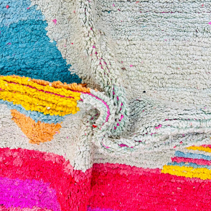 Vintage Moroccan wool rug with colorful abstract Berber design, handmade in Morocco