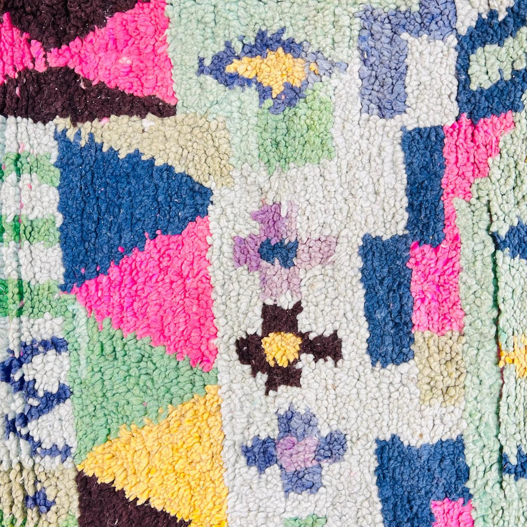 Vintage Moroccan wool rug with colorful geometric Berber pattern, pink blue cream yellow, 235x158 cm handmade in Morocco