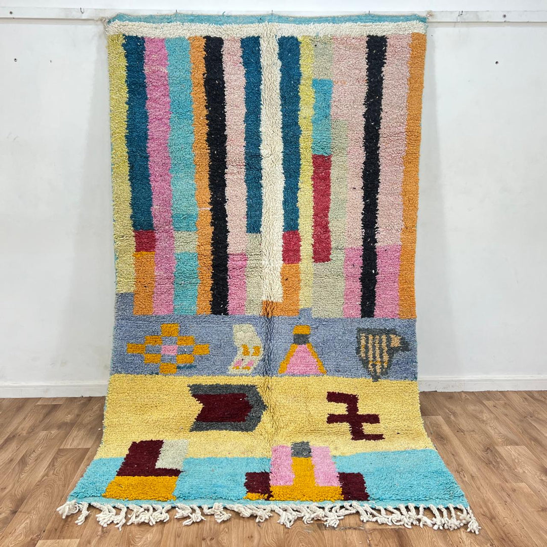 Vintage Moroccan wool rug with colorful vertical stripes and geometric Berber pattern, handmade in Morocco, size 253 x 155 cm.