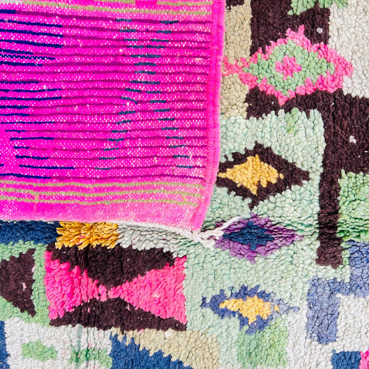 Vintage Moroccan wool rug with colorful geometric Berber pattern, pink blue cream yellow, 235x158 cm handmade in Morocco