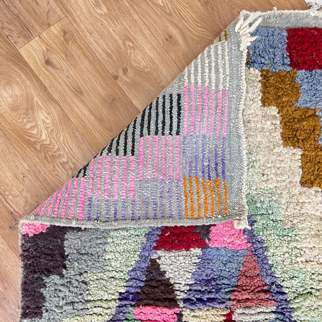 Vintage Moroccan wool runner rug with colorful Berber diamond and zigzag geometric patterns, handmade in Morocco, 383x82 cm