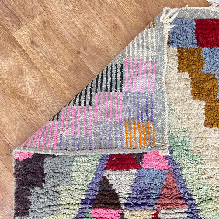 Vintage Moroccan wool runner rug with colorful Berber diamond and zigzag geometric patterns, handmade in Morocco, 383x82 cm