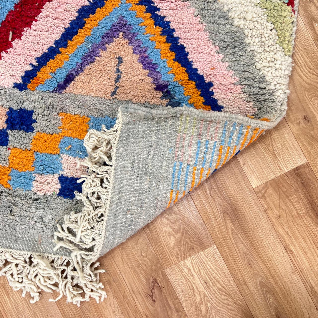 Vintage Moroccan wool runner rug with colorful Berber diamond and zigzag geometric patterns, handmade in Morocco, 383x82 cm