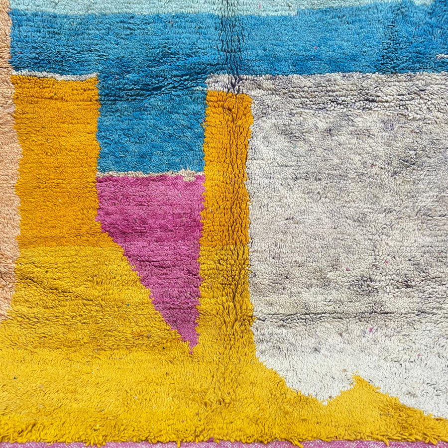 Vintage Moroccan wool rug with abstract color block pattern in mustard yellow, blush pink, turquoise, ivory and charcoal, handmade Berber rug