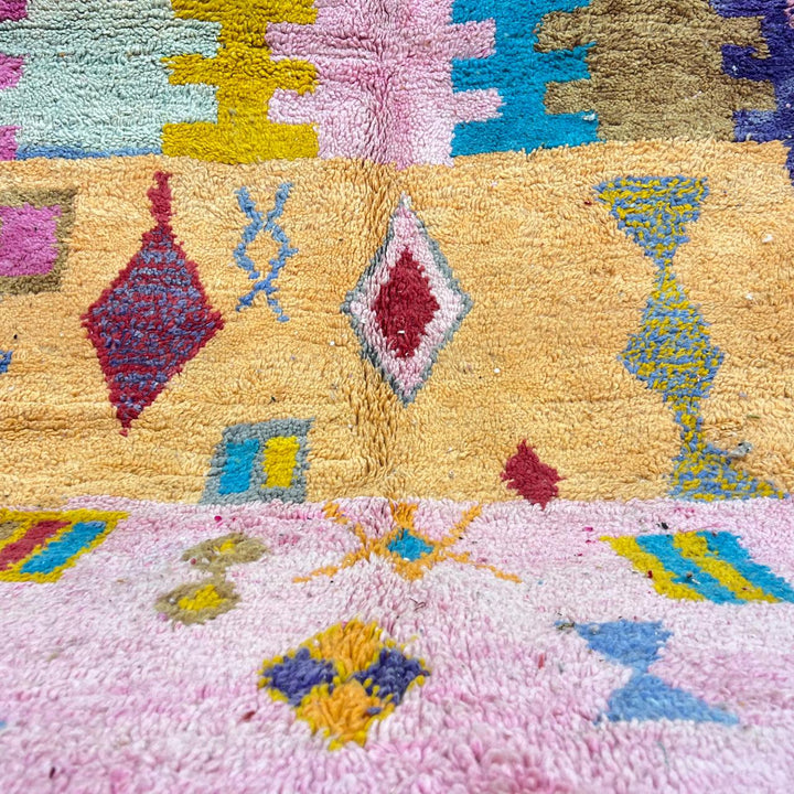 Vintage Moroccan wool rug with abstract geometric design in pink, beige, teal and mustard, handmade Berber carpet from Morocco, size 275x154 cm