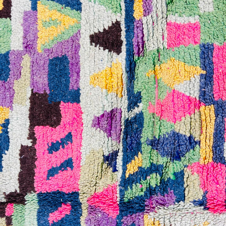 Vintage Moroccan wool rug with colorful geometric Berber pattern, pink blue cream yellow, 235x158 cm handmade in Morocco