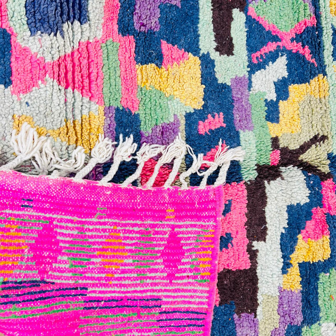 Vintage Moroccan wool rug with colorful geometric Berber pattern, pink blue cream yellow, 235x158 cm handmade in Morocco