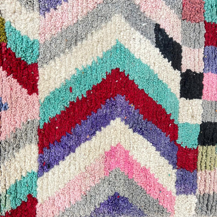 Vintage Moroccan wool runner rug with colorful Berber diamond and zigzag geometric patterns, handmade in Morocco, 383x82 cm