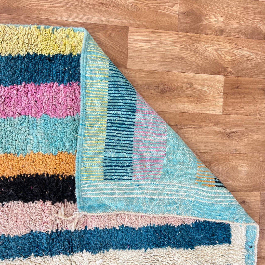 Vintage Moroccan wool rug with colorful vertical stripes and geometric Berber pattern, handmade in Morocco, size 253 x 155 cm.