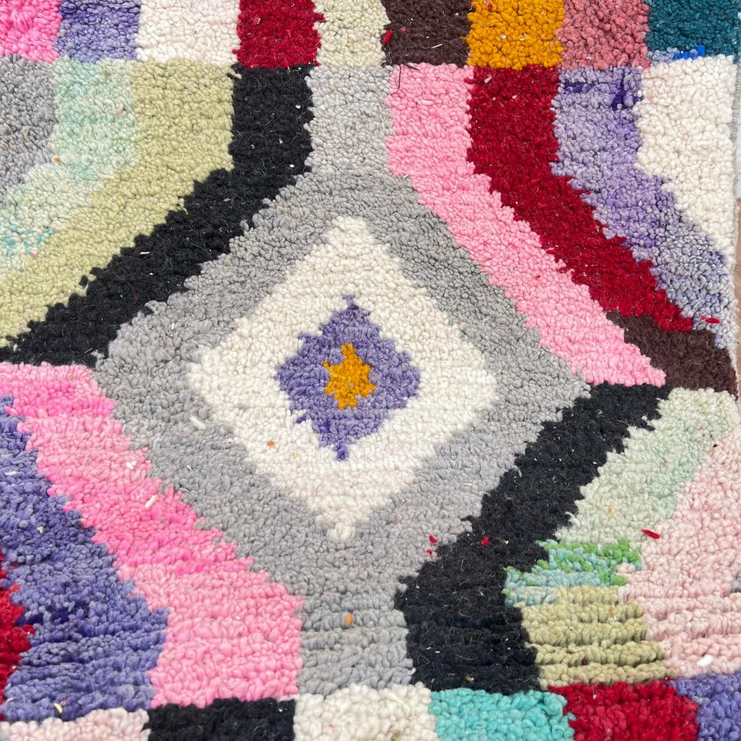 Vintage Moroccan wool runner rug with colorful Berber diamond and zigzag geometric patterns, handmade in Morocco, 383x82 cm
