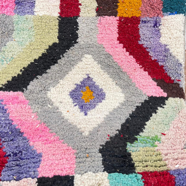 Vintage Moroccan wool runner rug with colorful Berber diamond and zigzag geometric patterns, handmade in Morocco, 383x82 cm