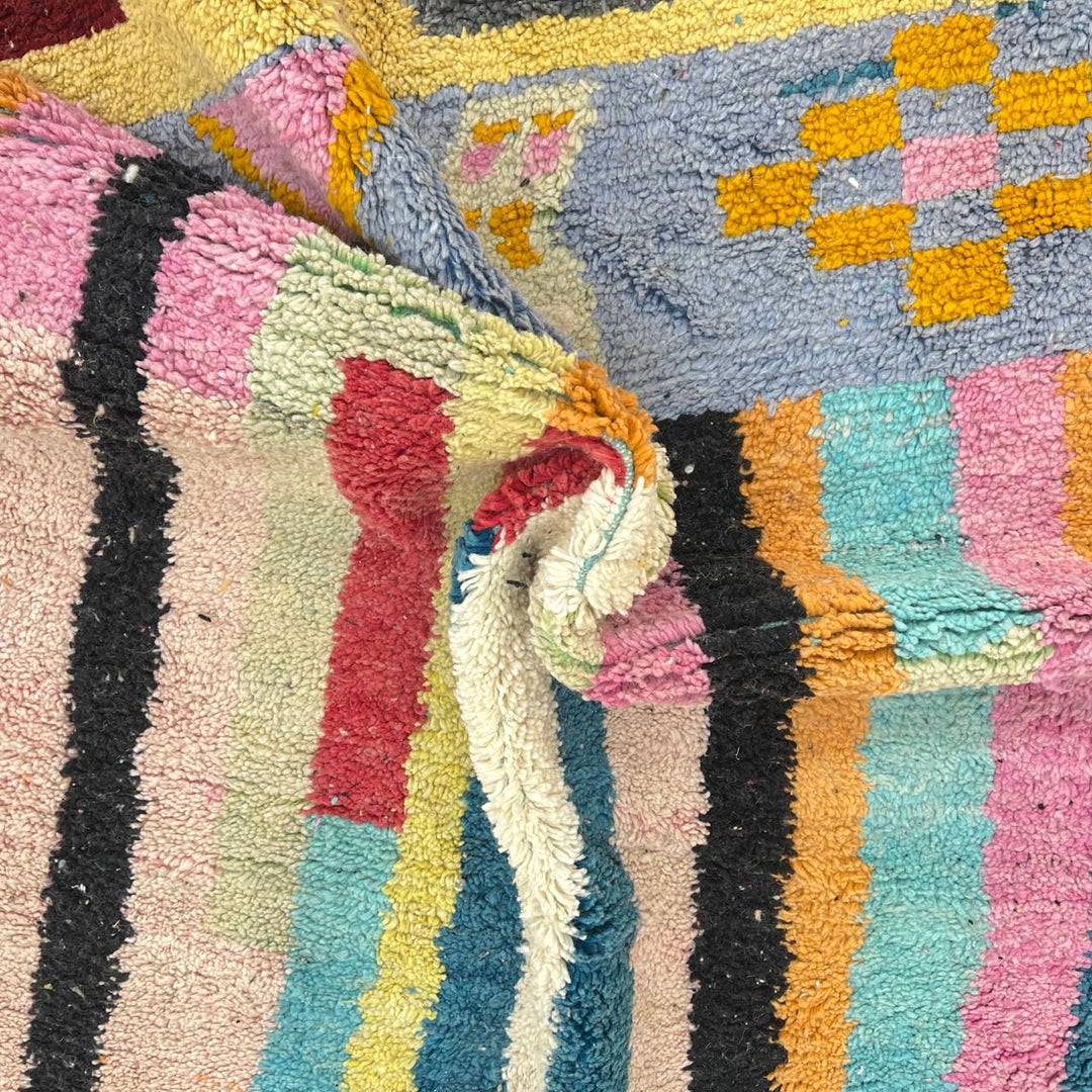 Vintage Moroccan wool rug with colorful vertical stripes and geometric Berber pattern, handmade in Morocco, size 253 x 155 cm.