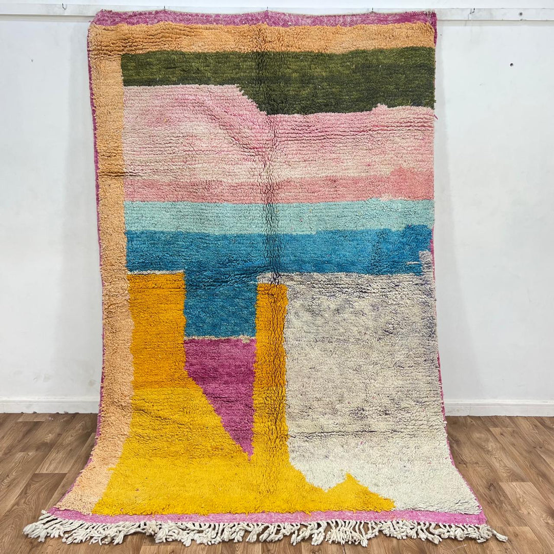 Vintage Moroccan wool rug with abstract color block pattern in mustard yellow, blush pink, turquoise, ivory and charcoal, handmade Berber rug