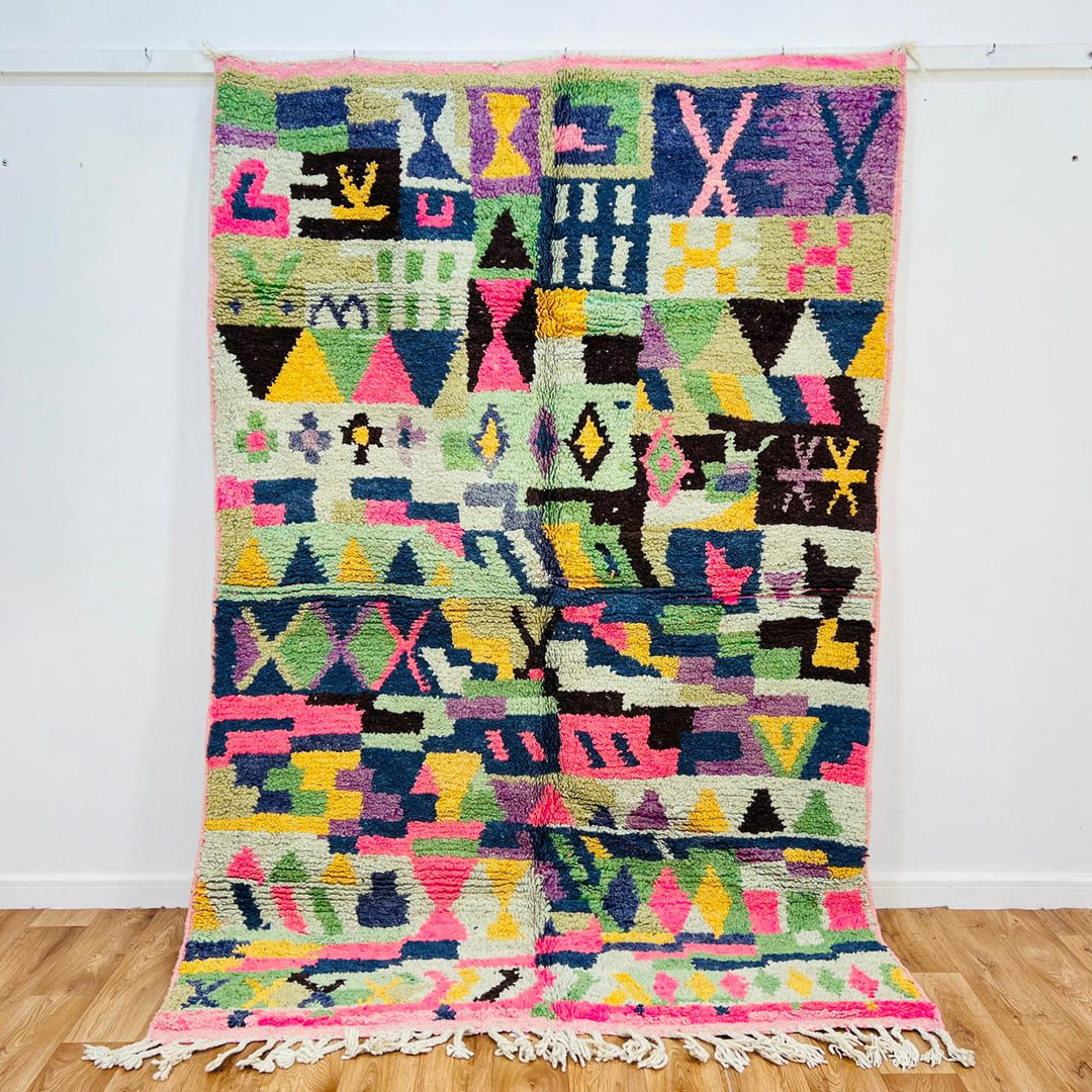 Vintage Moroccan wool rug with colorful geometric Berber pattern, pink blue cream yellow, 235x158 cm handmade in Morocco