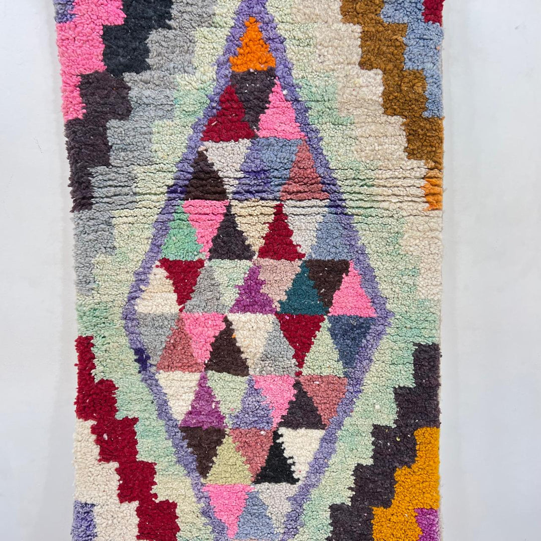 Vintage Moroccan wool runner rug with colorful Berber diamond and zigzag geometric patterns, handmade in Morocco, 383x82 cm