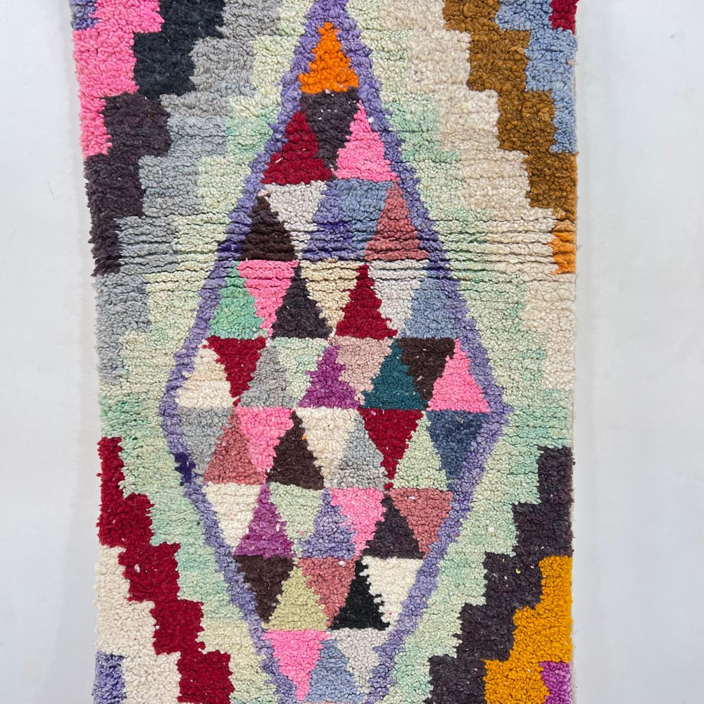 Vintage Moroccan wool runner rug with colorful Berber diamond and zigzag geometric patterns, handmade in Morocco, 383x82 cm