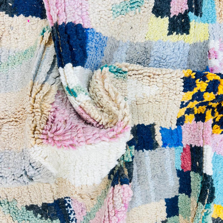 Vintage Moroccan wool rug with colorful patchwork Berber geometric design in pastel tones, handmade in Morocco