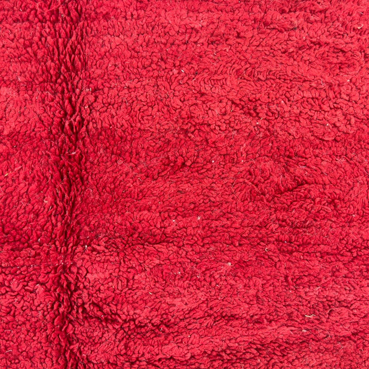 Vintage Moroccan wool rug in deep red with abstract black, ivory, and blue color blocks, handmade Berber rug