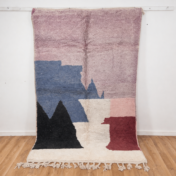 Vintage Moroccan wool rug with abstract geometric blocks in beige, dusty pink, charcoal, and burgundy tones, handmade Berber rug