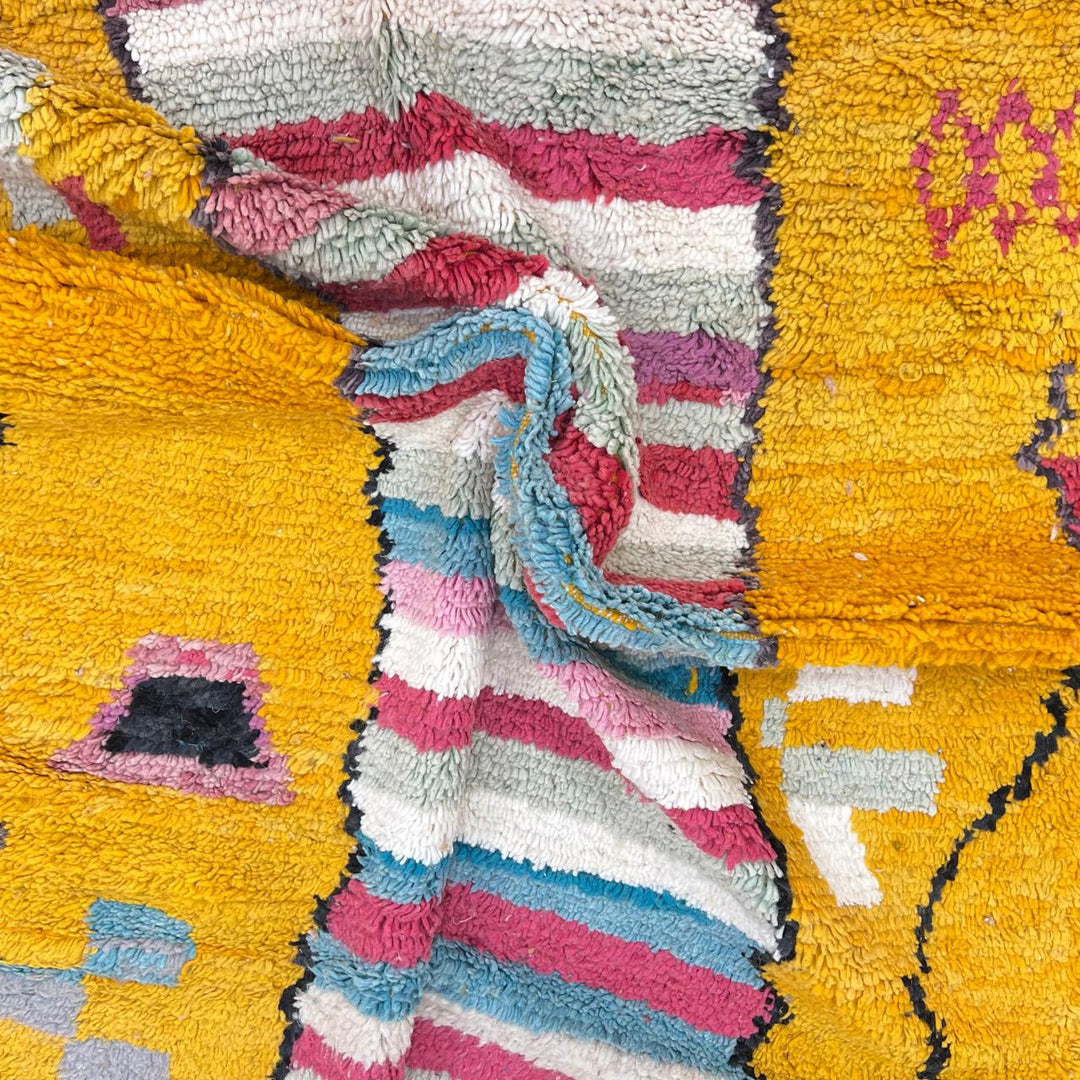 Vintage Moroccan wool rug with mustard yellow background and central striped pastel panel, abstract geometric Berber carpet 265x153 cm