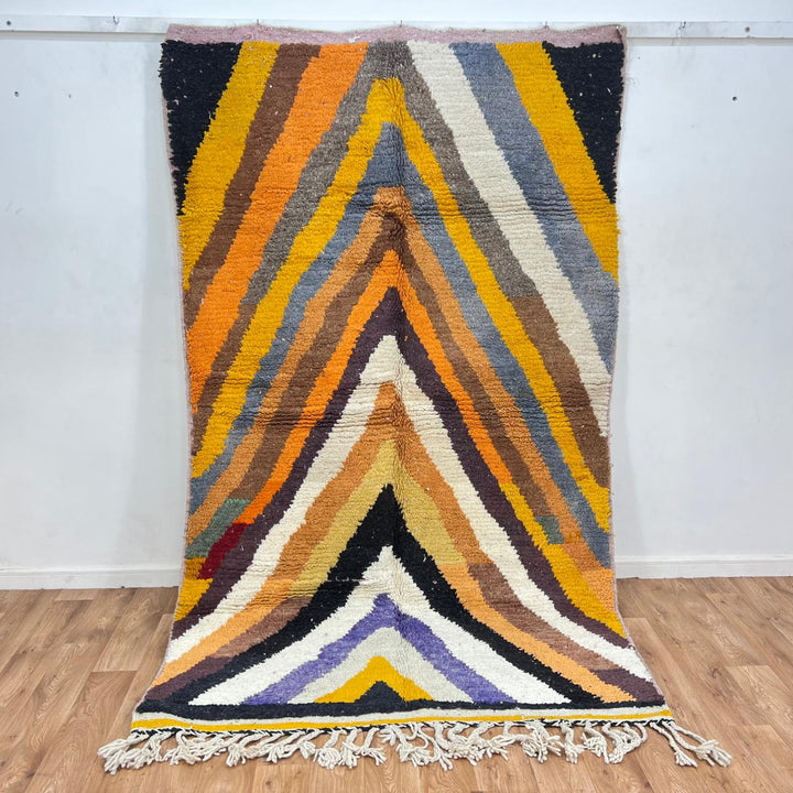 Vintage Moroccan wool rug with chevron tribal pattern in mustard yellow, orange, cream, black and blue, handwoven Berber rug 258x155 cm